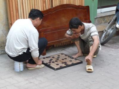 Playing games on the street in Hanoi